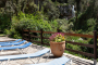 Pool terraces and the cascade as backdrop